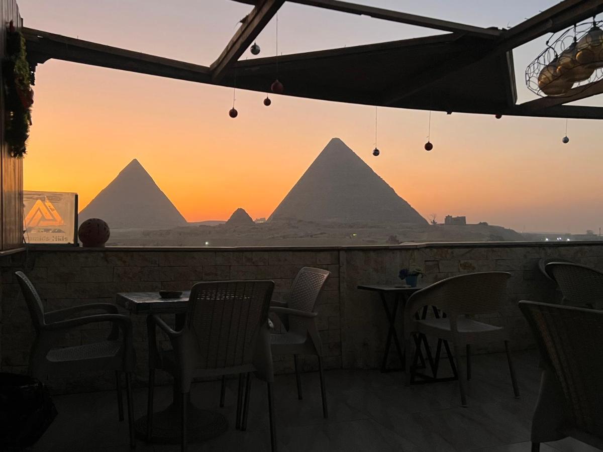 Imhotep Pyramids View Inn Kafrat al Jabal Bagian luar foto