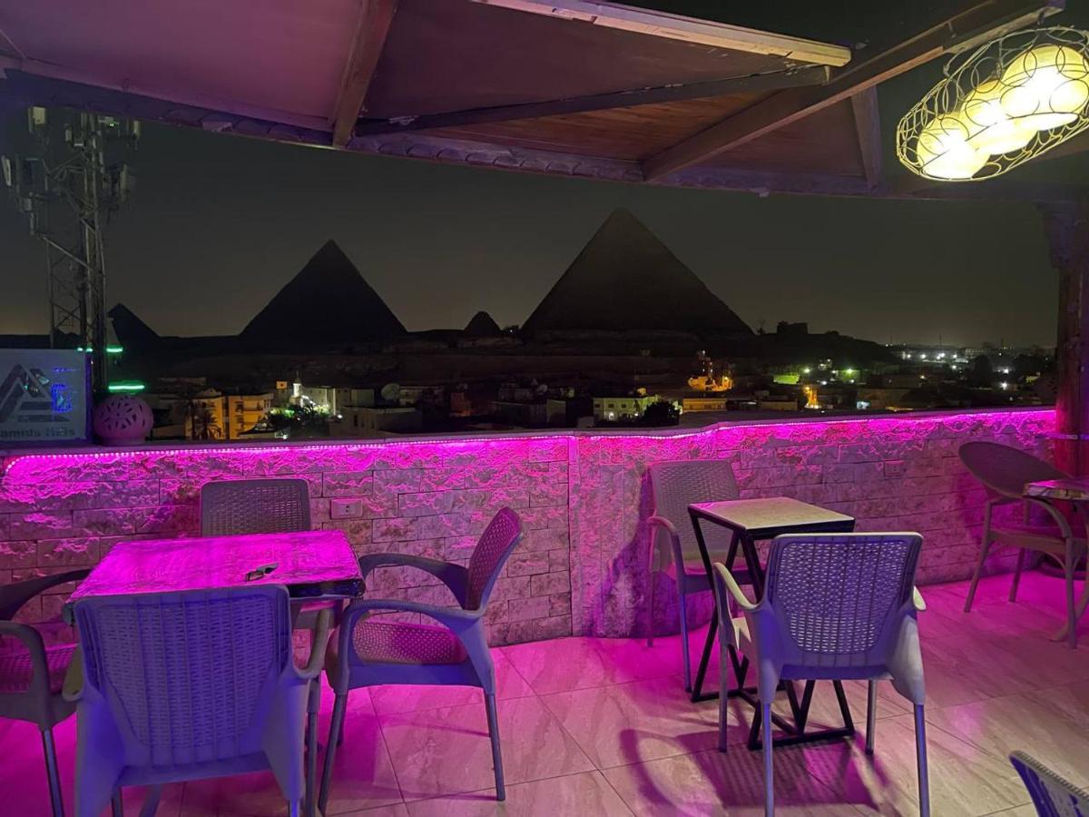 Imhotep Pyramids View Inn Kafrat al Jabal Bagian luar foto