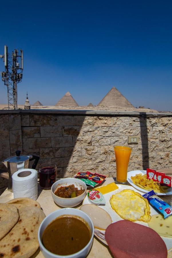 Imhotep Pyramids View Inn Kafrat al Jabal Bagian luar foto