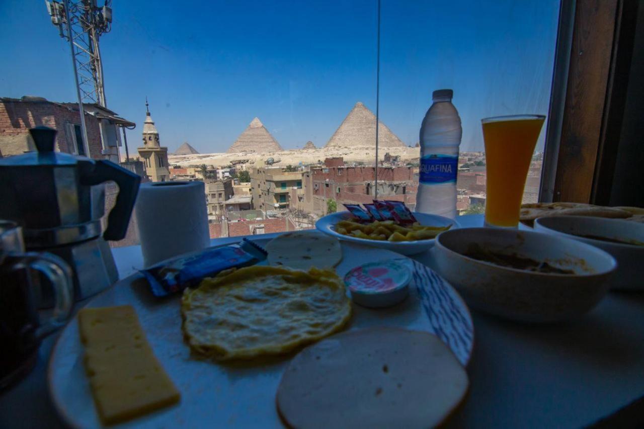 Imhotep Pyramids View Inn Kafrat al Jabal Bagian luar foto